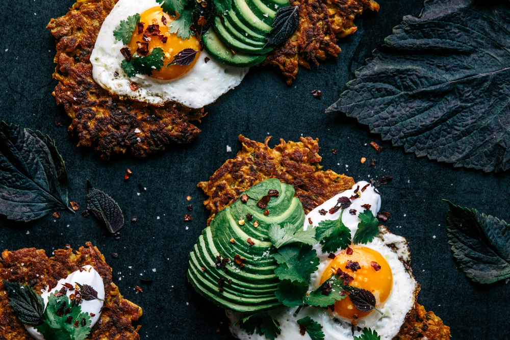 Turmeric Spiced Carrot & Halloumi Fritters with Coriander, Fried Eggs & Avocado  |  Gather & Feast